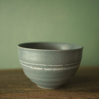 Petit bol gris petit trait blanc